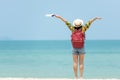 Happy traveler and tourism women travel summer on the beach.ÃÂ 